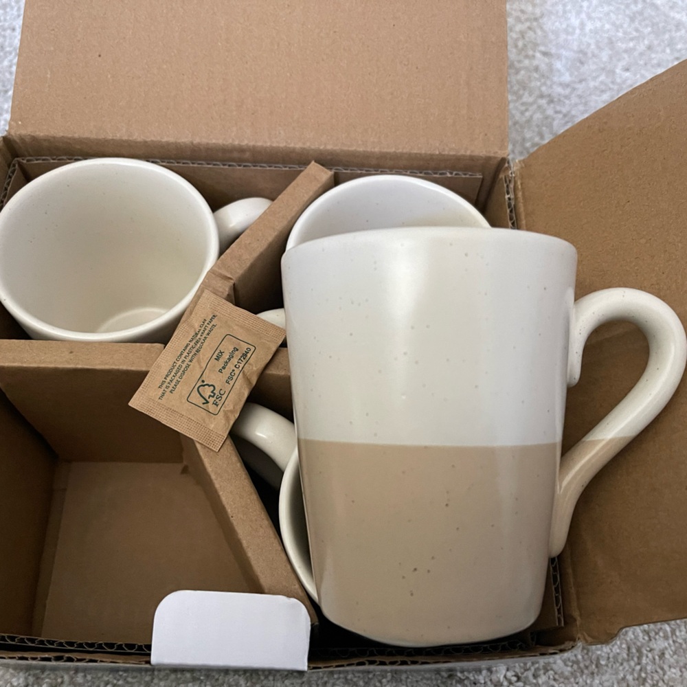 New in box Short Stories 4 piece mug set.
